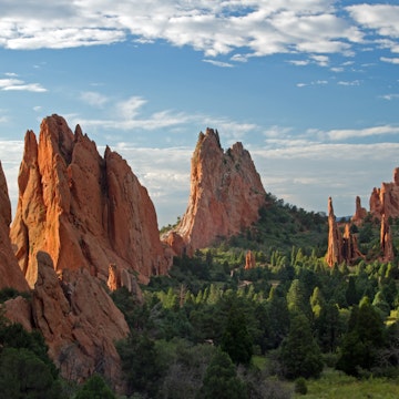 Blue skies with clouds over lookout view of Garden of the Gods